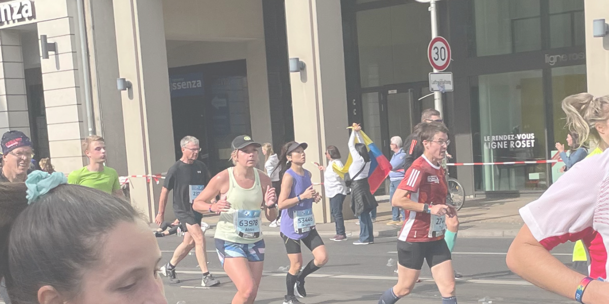 A woman is running on a treadmill
